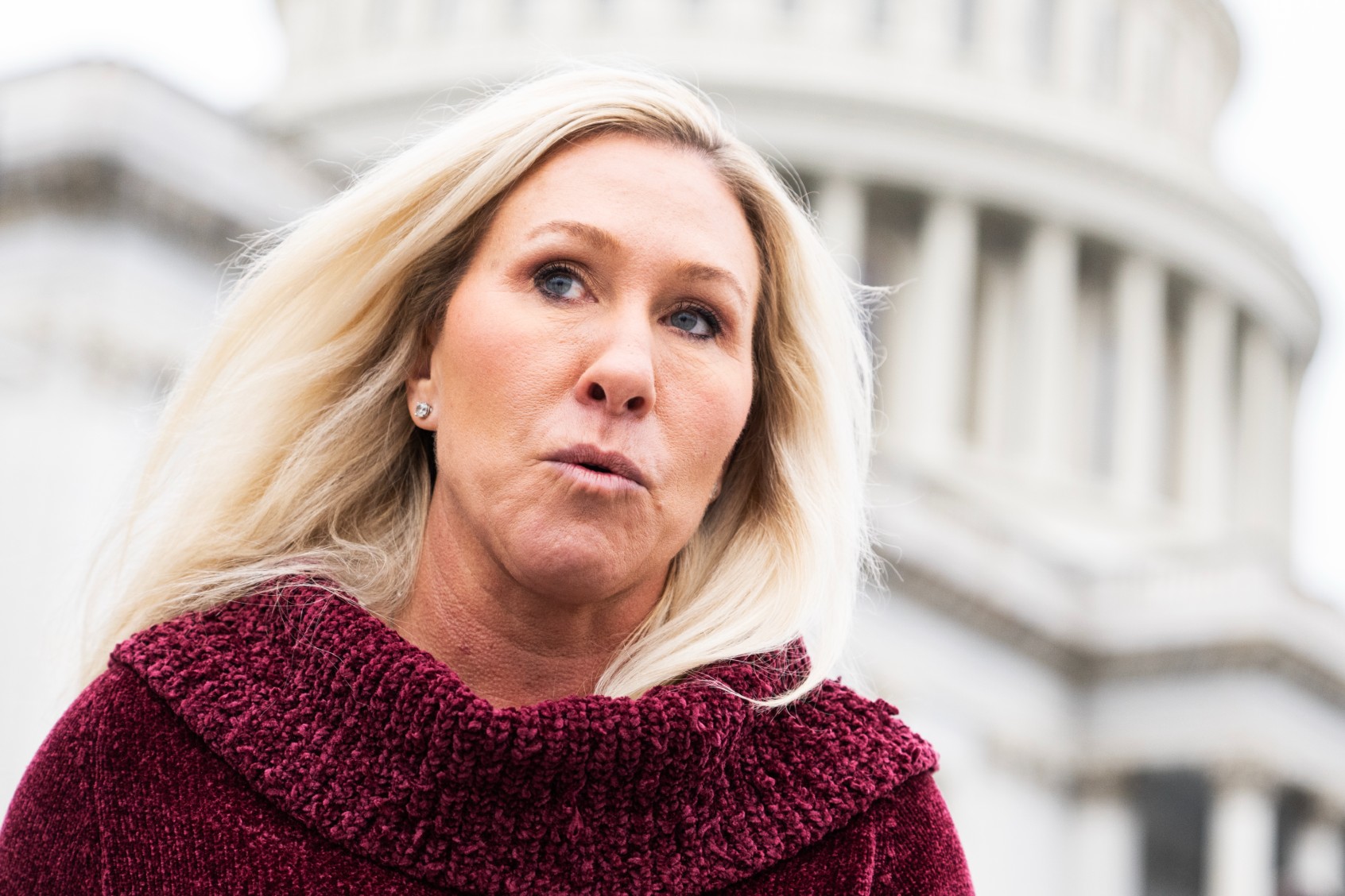 Rep. Marjorie Taylor Greene, R-Ga., is seen outside the U.S. Capitol after last votes of the week on Thursday, December 7, 2023. (Tom Williams/CQ-Roll Call, Inc via Getty Images)
