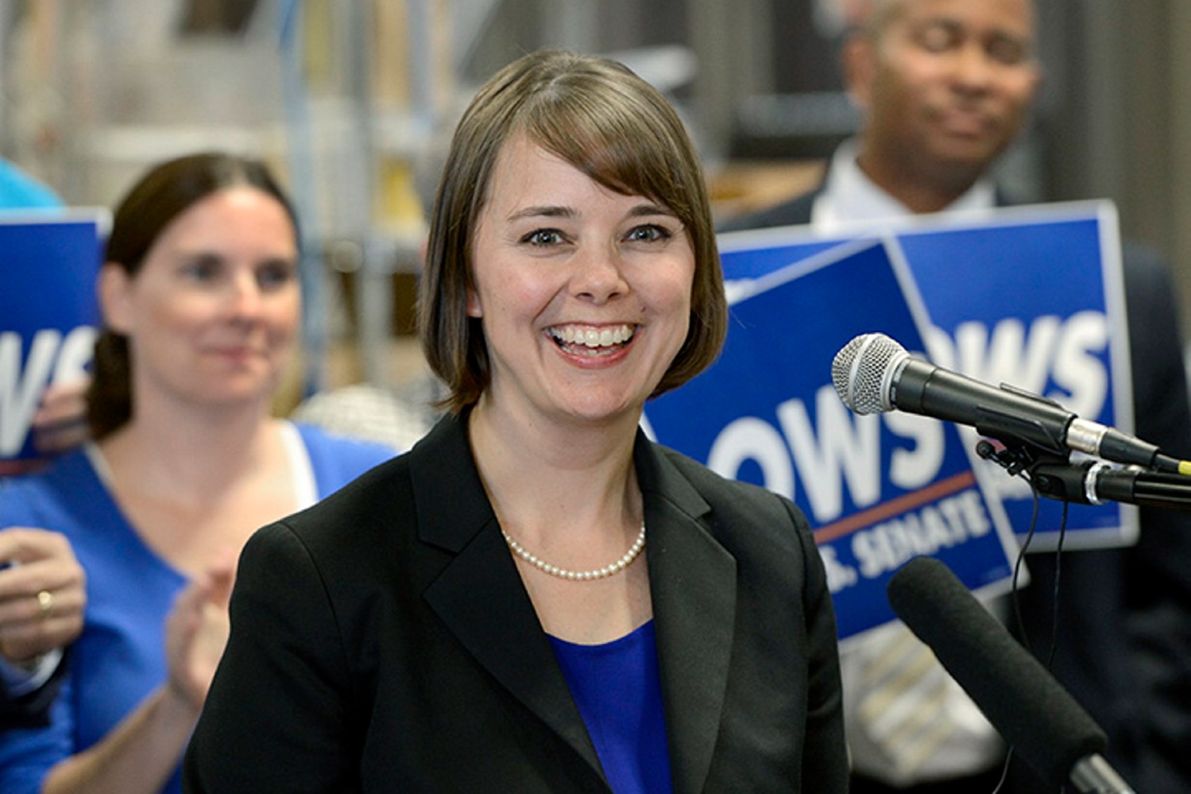 Shenna Bellows is all smiles as she launched her campaign to challenge Sen. Susan Collins during a press conference at Rising Tide Brewery in Portland. (ohn Patriquin/Portland Press Herald via Getty Images)