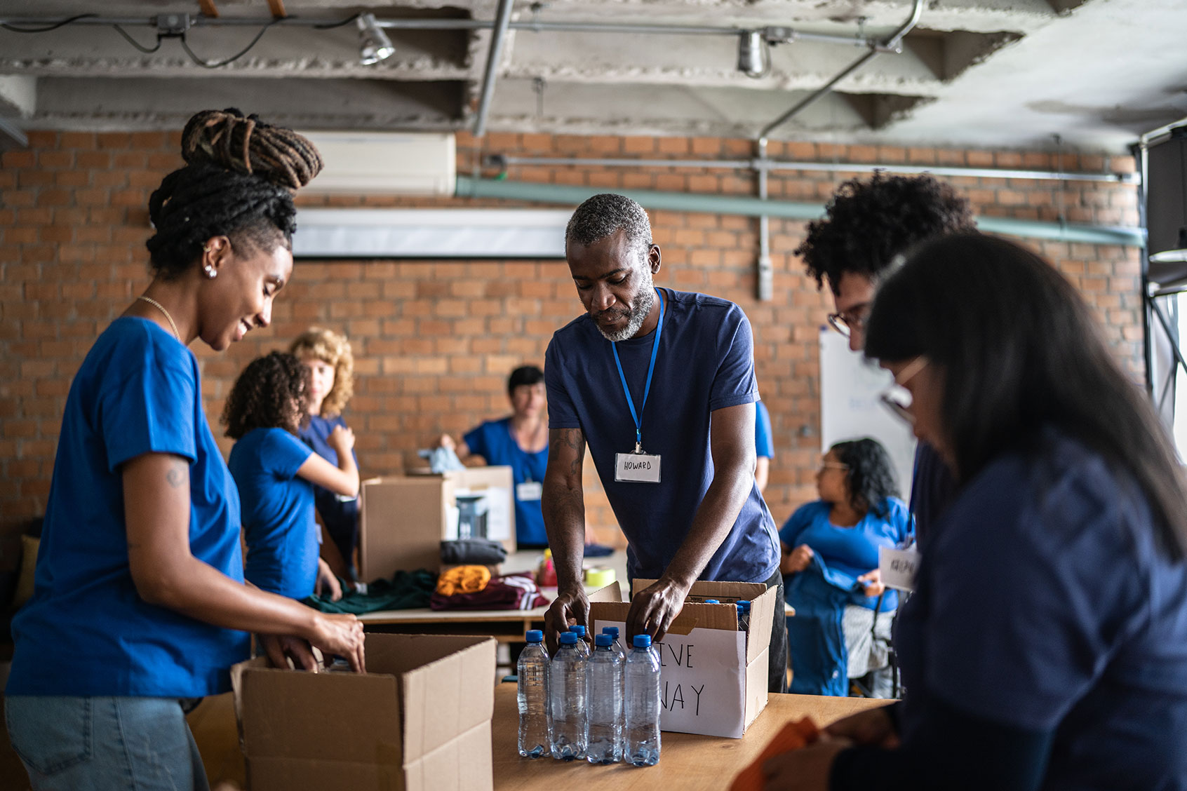 Volunteers arranging donations (Getty Images/FG Trade)