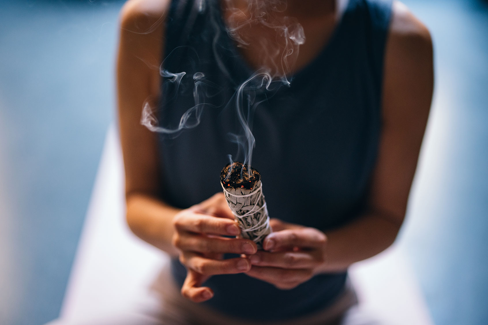 Woman Burning Sage Stick, Smudge Stick (Getty Images/miniseries)