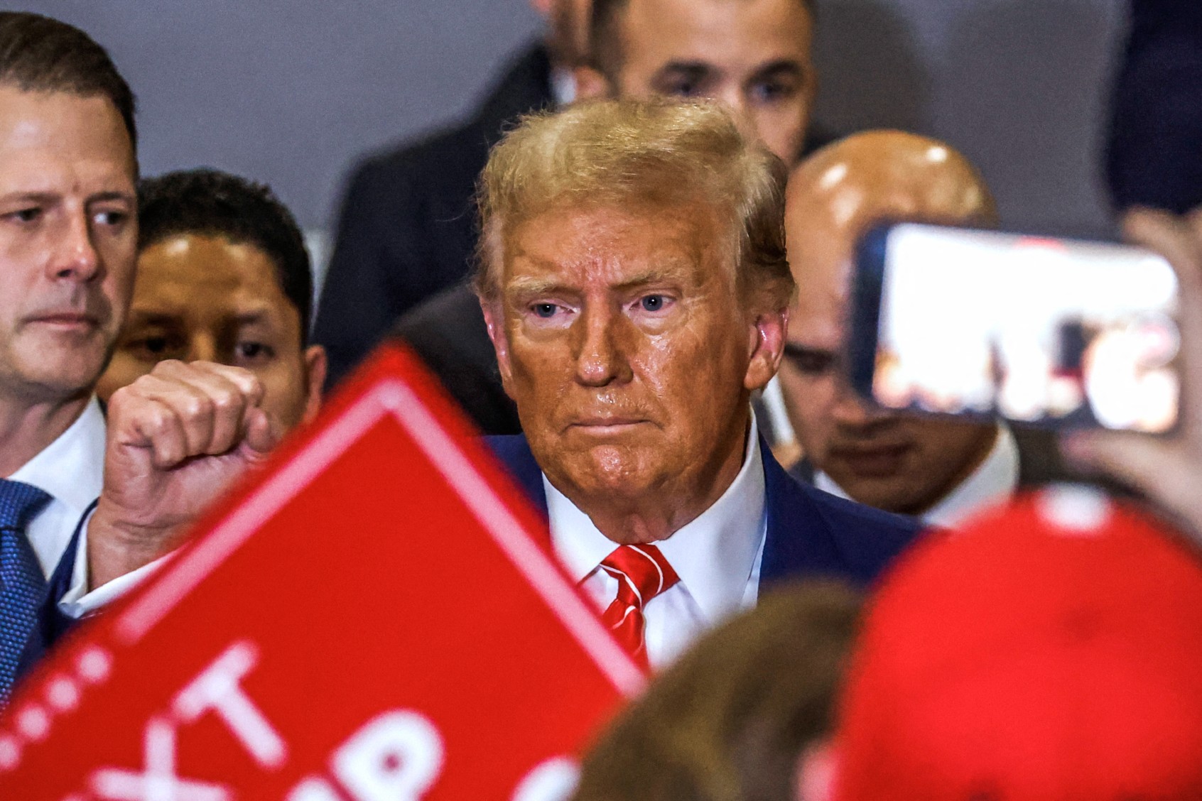 Former U.S. President and Republican presidential hopeful Donald Trump departs after speaking at a "Commit to Caucus" rally in Clinton, Iowa, on January 6, 2024. (TANNEN MAURY/AFP via Getty Images)