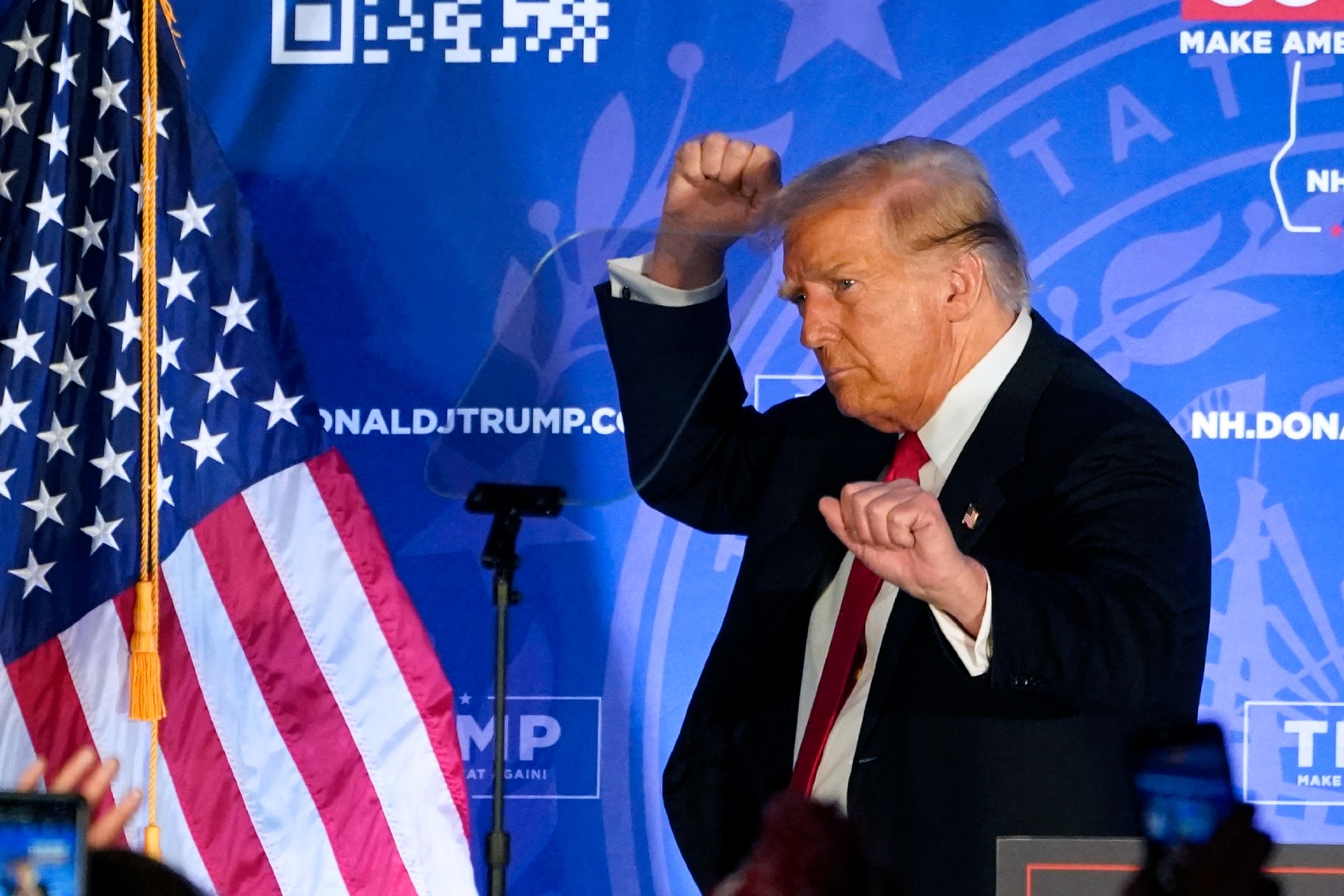 Republican presidential candidate and former US President Donald Trump gestures at a campaign event in Portsmouth, New Hampshire, on January 17, 2024. (TIMOTHY A. CLARY/AFP via Getty Images)