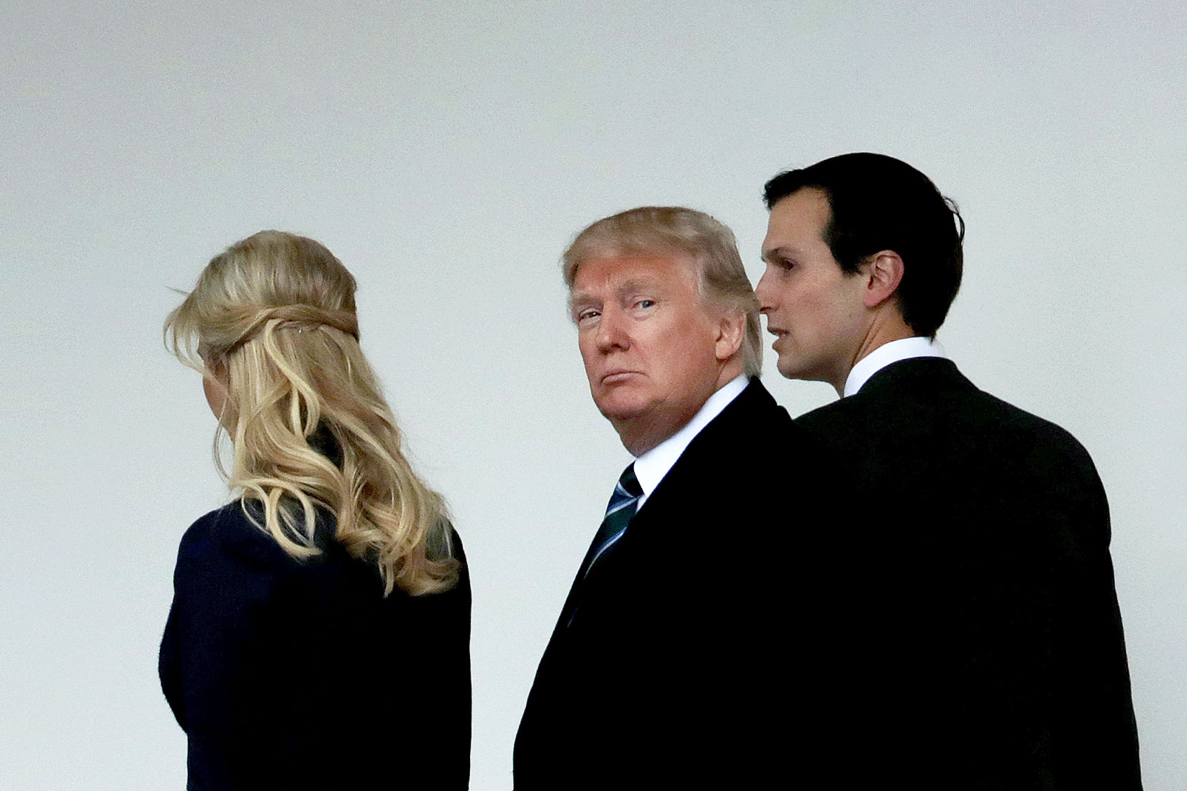U.S. President Donald Trump (C) walks along the West Wing colonnade with his daughter Ivanka Trump (L) and his son-in-law and Senior Advisor to the President for Strategic Planning Jared Kushner before he departs the White House March 17, 2017 in Washington, DC. (Chip Somodevilla/Getty Images)