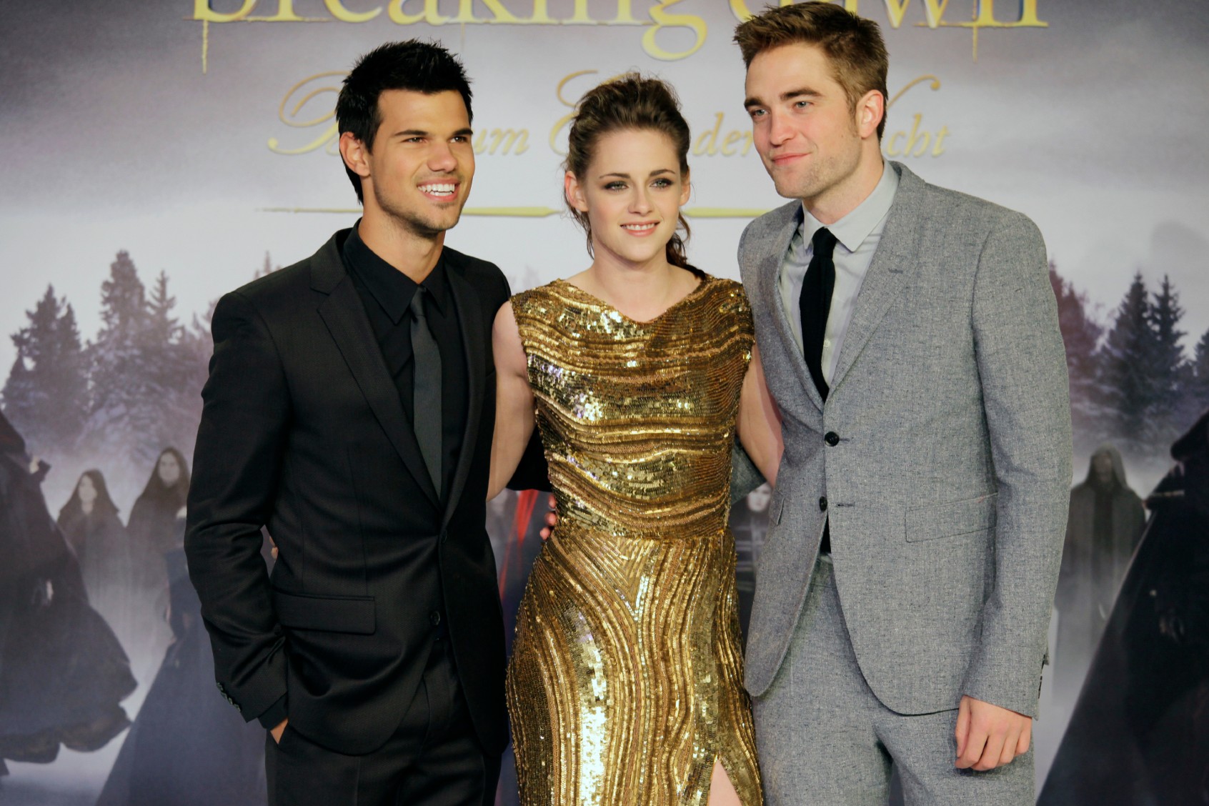 Taylor Lautner, Kristen Stewart and Robert Pattinson at a premiere event for "Twilight: Breaking Dawn Part 2" (Popow/ullstein bild via Getty Images)