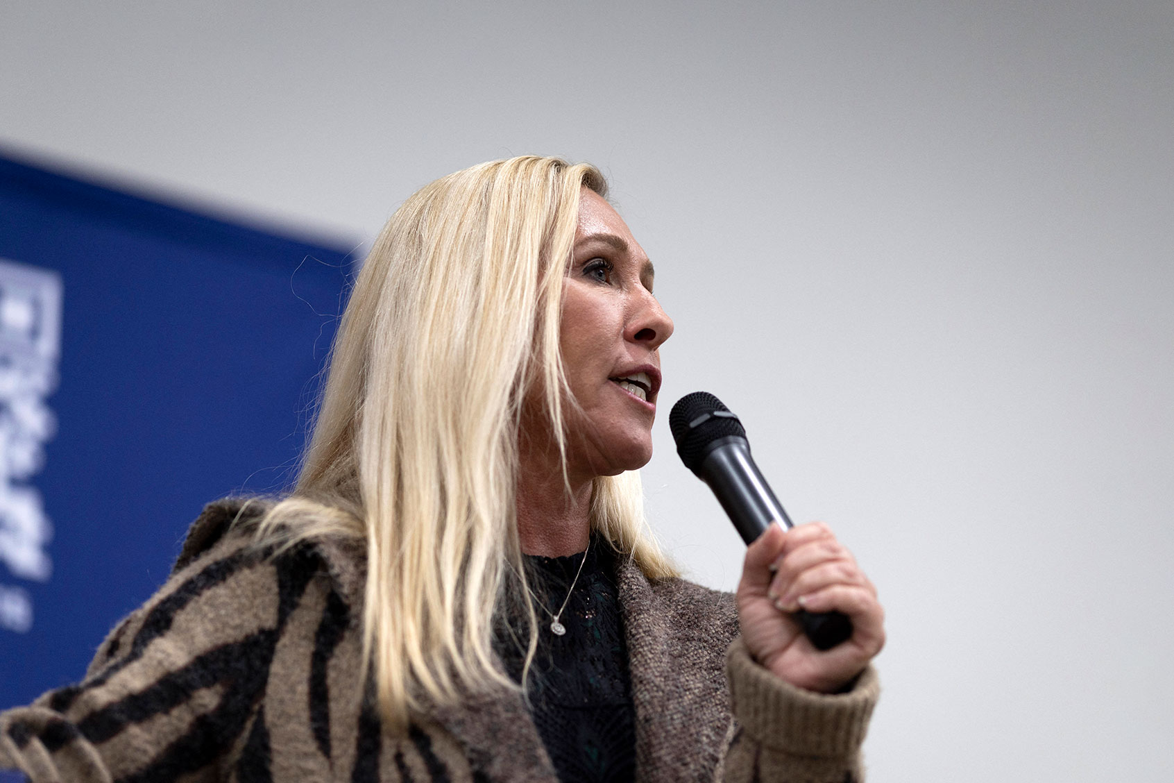 US Representative Marjorie Taylor Greene (R-GA) speaks during a "Commit to Caucus" Team Trump Iowa event at the Hidden Tower wedding venue in Keokuk, Iowa on January 4, 2024. (CHRISTIAN MONTERROSA/AFP via Getty Images)