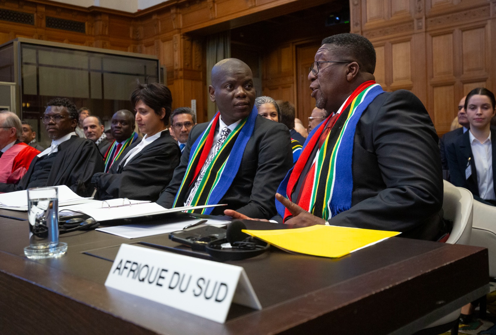 Vusimuzi Madonsela, South African Amabassador in the Netherlands, and Ronald Lamola, South African Minister of Justice prepare to attend a heraring as South Africa has requested the court to indicate measures concerning alleged violations of human rights by Israel in Gaza on January 11, 2024 in The Hague, Netherlands. (Michel Porro/Getty Images)