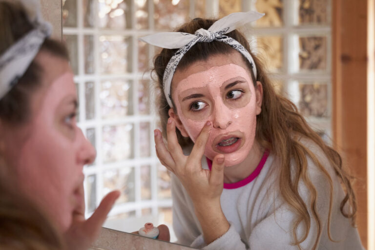 Portrait of teenager applying facial mask to improving her skin. (Getty Images/RUBEN BONILLA GONZALO)