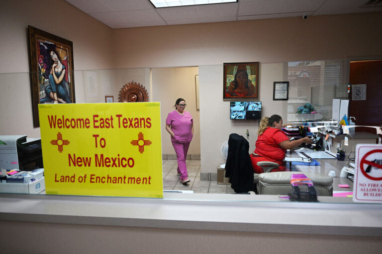 A sign welcoming patients from East Texas is displayed in the waiting area of the Women's Reproductive Clinic, which provides legal medication abortion services, in Santa Teresa, New Mexico, on June 15, 2022. (ROBYN BECK/AFP via Getty Images)