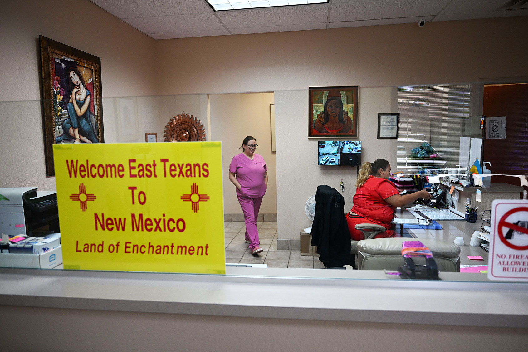 A sign welcoming patients from East Texas is displayed in the waiting area of the Women's Reproductive Clinic, which provides legal medication abortion services, in Santa Teresa, New Mexico, on June 15, 2022. (ROBYN BECK/AFP via Getty Images)