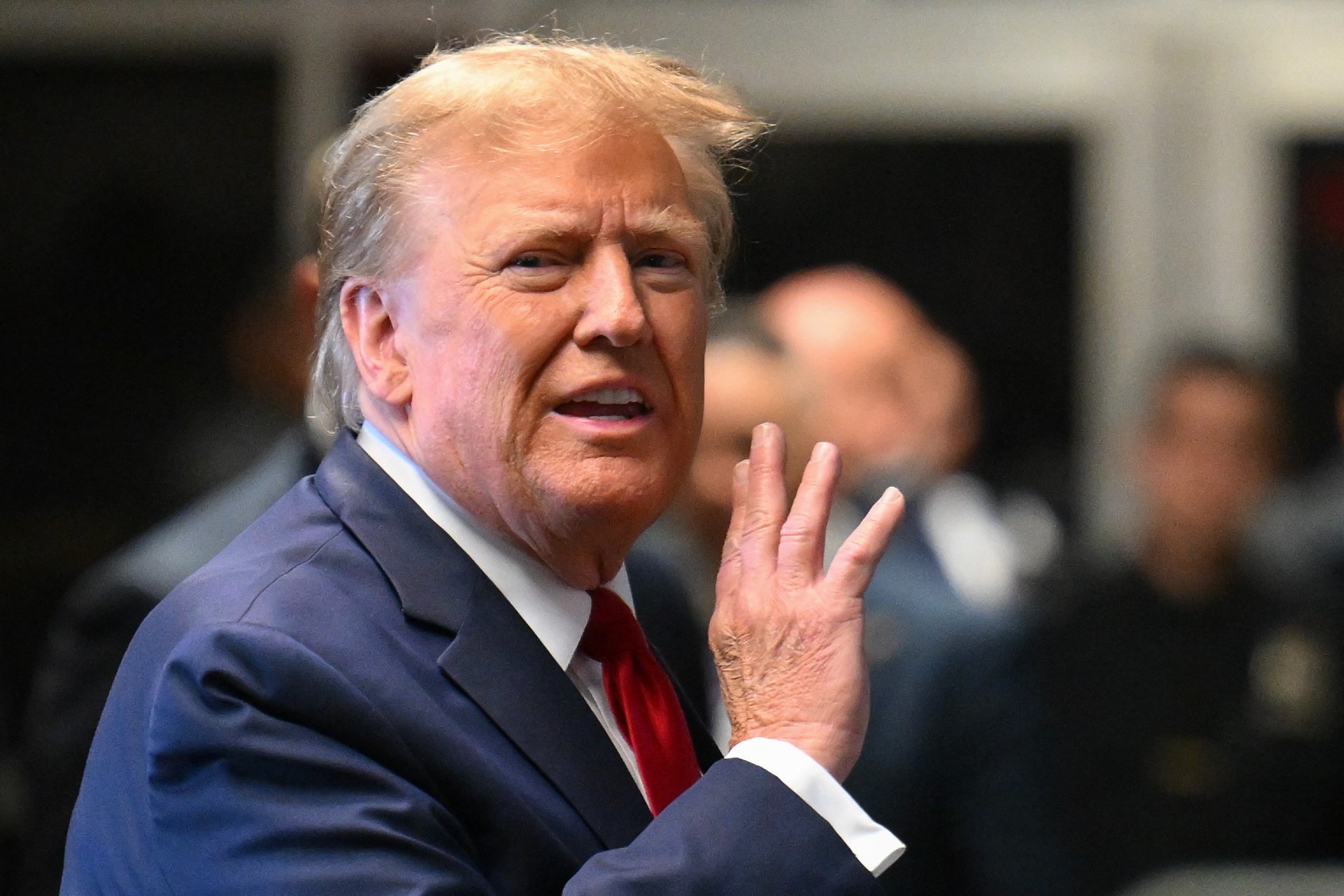 Former U.S. President Donald Trump speaks to the press at Manhattan Criminal Court after a hearing in his case of paying hush money to cover up extramarital affairs in New York City on February 15, 2024. (ANGELA WEISS/AFP via Getty Images)
