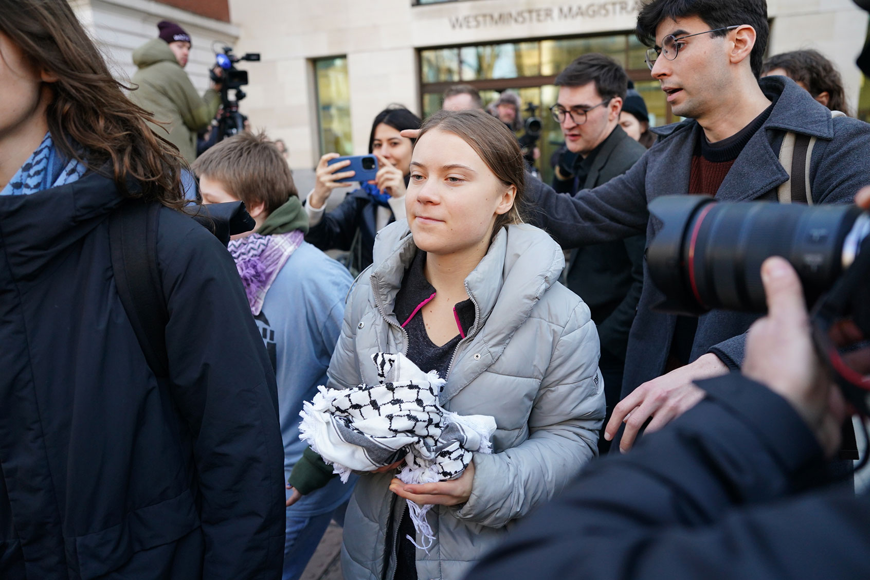 Greta Thunberg leaves Westminster Magistrates' Court, London, where she appeared charged, along with four other activists, with a public order offence during a protest in central London last year. (Jordan Pettitt/PA Images via Getty Images)