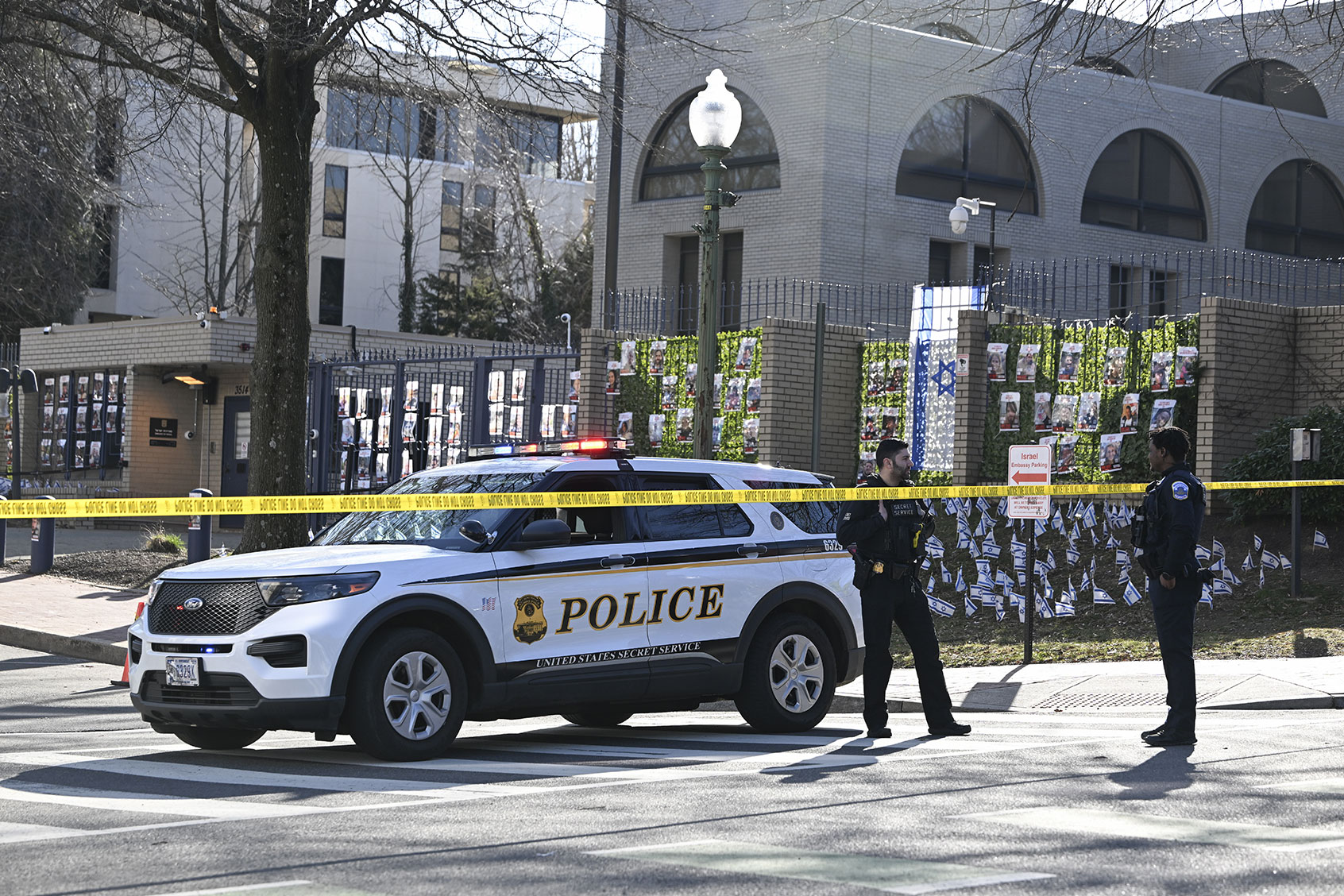 Police take security measures and investigate the crime scene after 25-year-old Aaron Bushnell, an active-duty member of the US Air Force, set himself on fire Sunday outside the Israeli Embassy in Washington, D.C. in protest against the war in Gaza on February 25, 2024. (Celal Gunes/Anadolu via Getty Images)