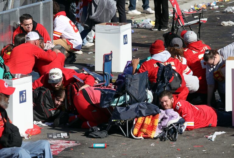 People take cover during a shooting at Union Station during the Kansas City Chiefs Super Bowl LVIII victory parade on February 14, 2024 in Kansas City, Missouri. (Jamie Squire/Getty Images)