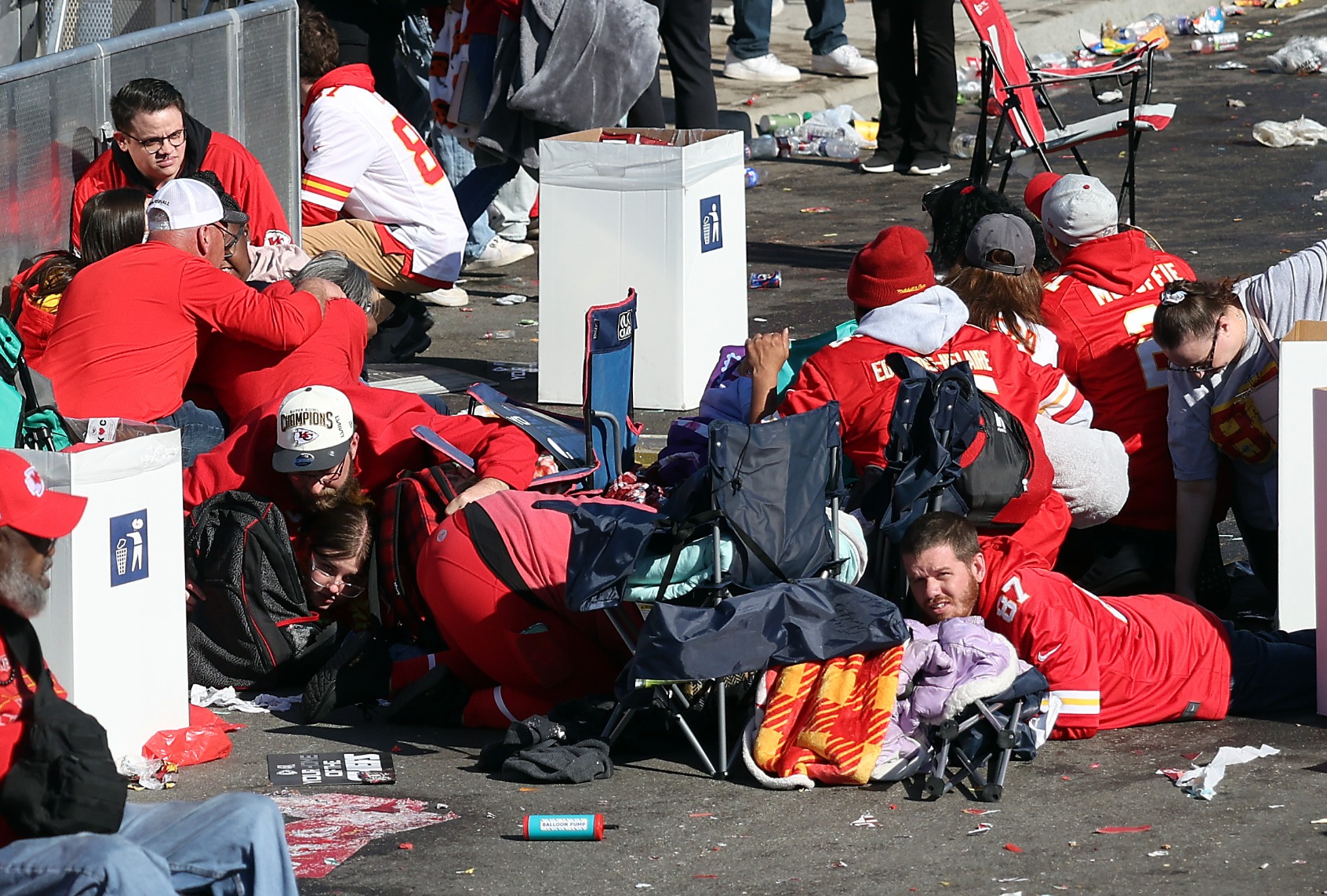 People take cover during a shooting at Union Station during the Kansas City Chiefs Super Bowl LVIII victory parade on February 14, 2024 in Kansas City, Missouri. (Jamie Squire/Getty Images)