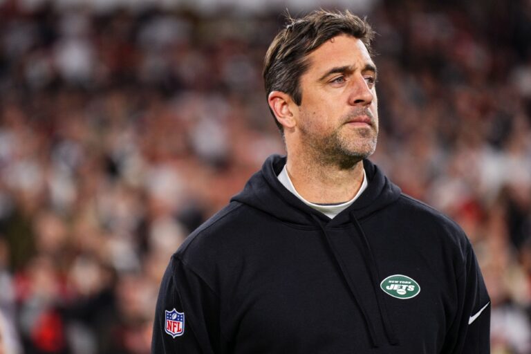 Aaron Rodgers, #8 of the New York Jets, looks on on from the sideline prior to an NFL football game against the Cleveland Browns at Cleveland Browns Stadium on December 28, 2023 in Cleveland, Ohio. (Cooper Neill/Getty Images)