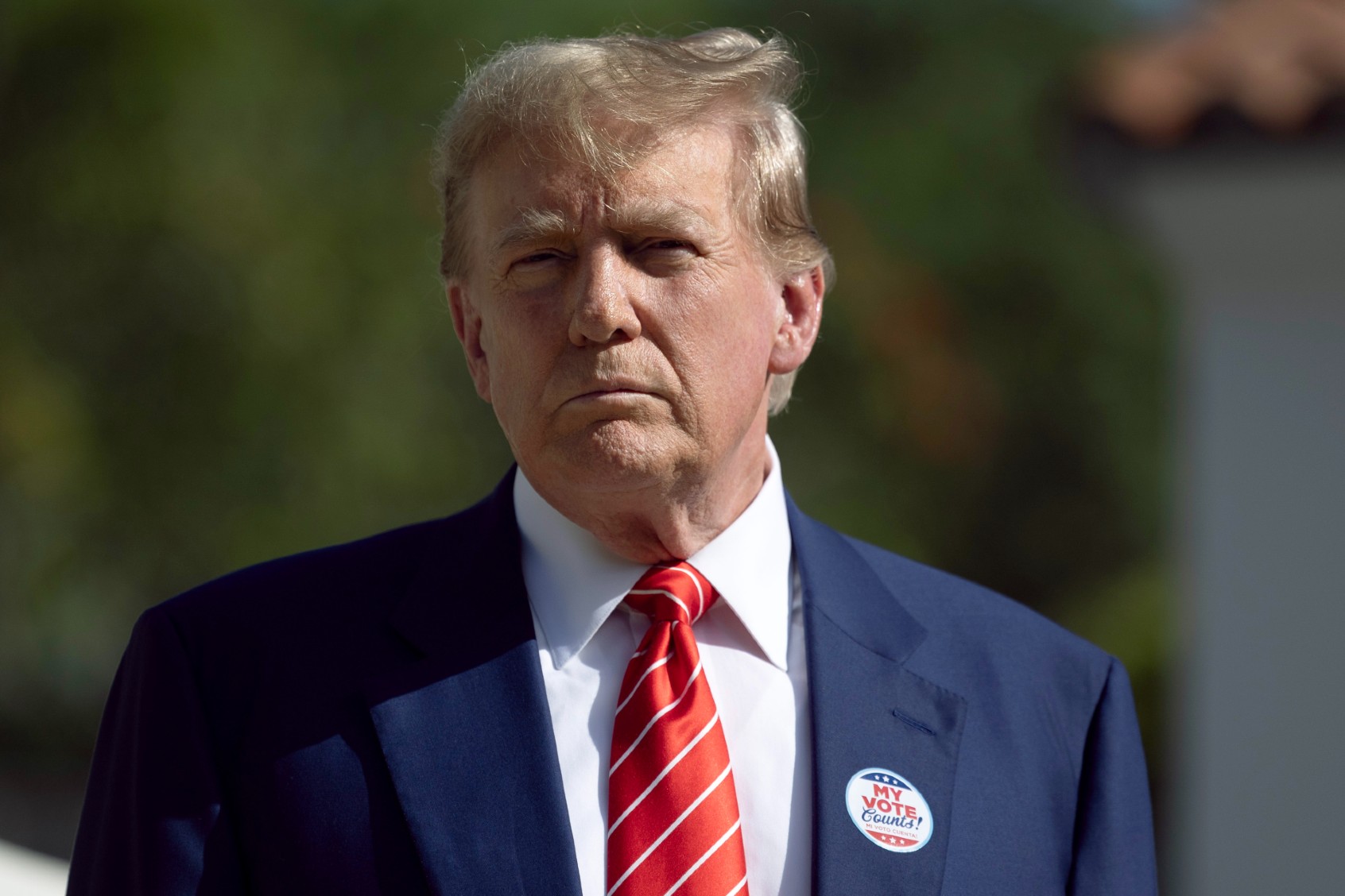 Former U.S. President Donald Trump speaks to the media after voting at a polling station setup in the Morton and Barbara Mandel Recreation Center on March 19, 2024, in Palm Beach, Florida. (Joe Raedle/Getty Images)
