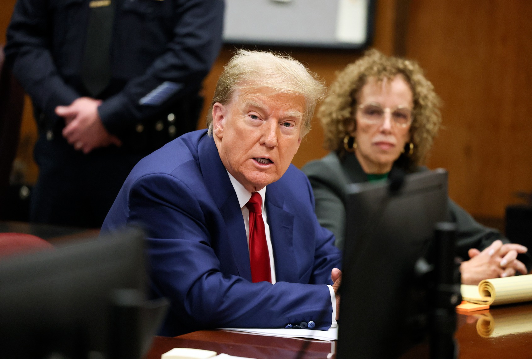 Former President Donald Trump waits with his lawyer Susan Necheles for the start of a hearing at Criminal Court on March 25, 2024 in New York City. (Brendan McDermid-Pool/Getty Images)