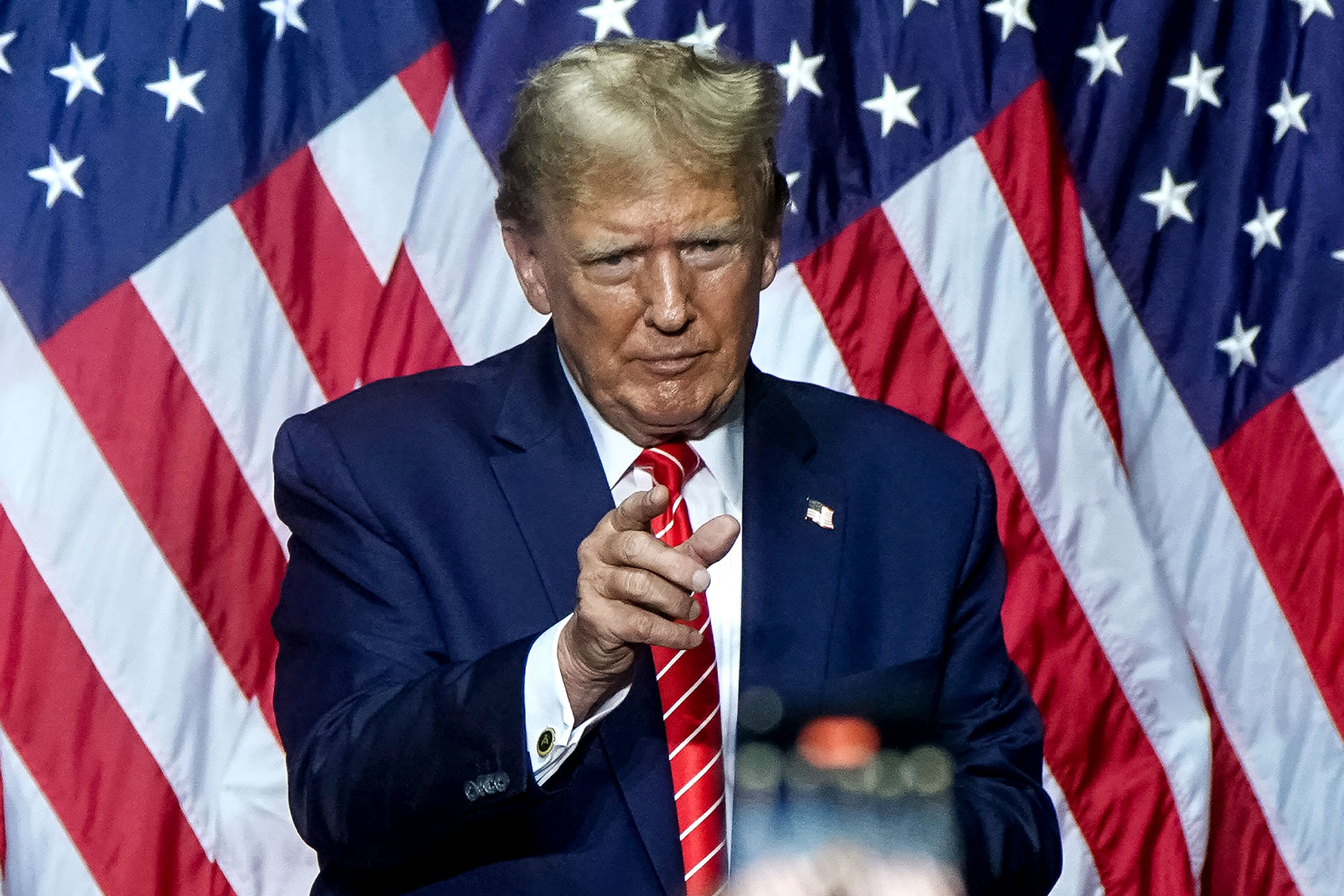 Former US President and 2024 presidential hopeful Donald Trump gestures to the crowd after speaking at a campaign event in Rome, Georgia, on March 9, 2024. (ELIJAH NOUVELAGE/AFP via Getty Images)
