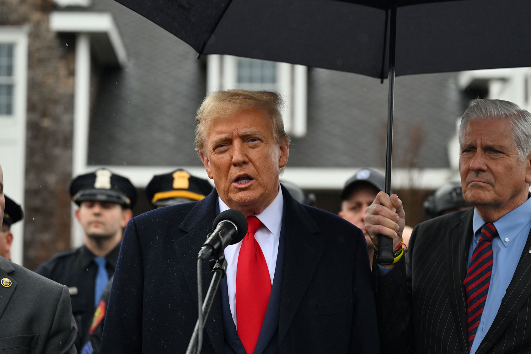Former US President Donald Trump speaks to the press (ANGELA WEISS/AFP via Getty Images)