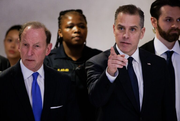 Hunter Biden (center) leaves with his attorney Abbe Lowell (left) for a closed-door deposition on February 28, 2024 in Washington, DC. (Samuel Corum/Getty Images)