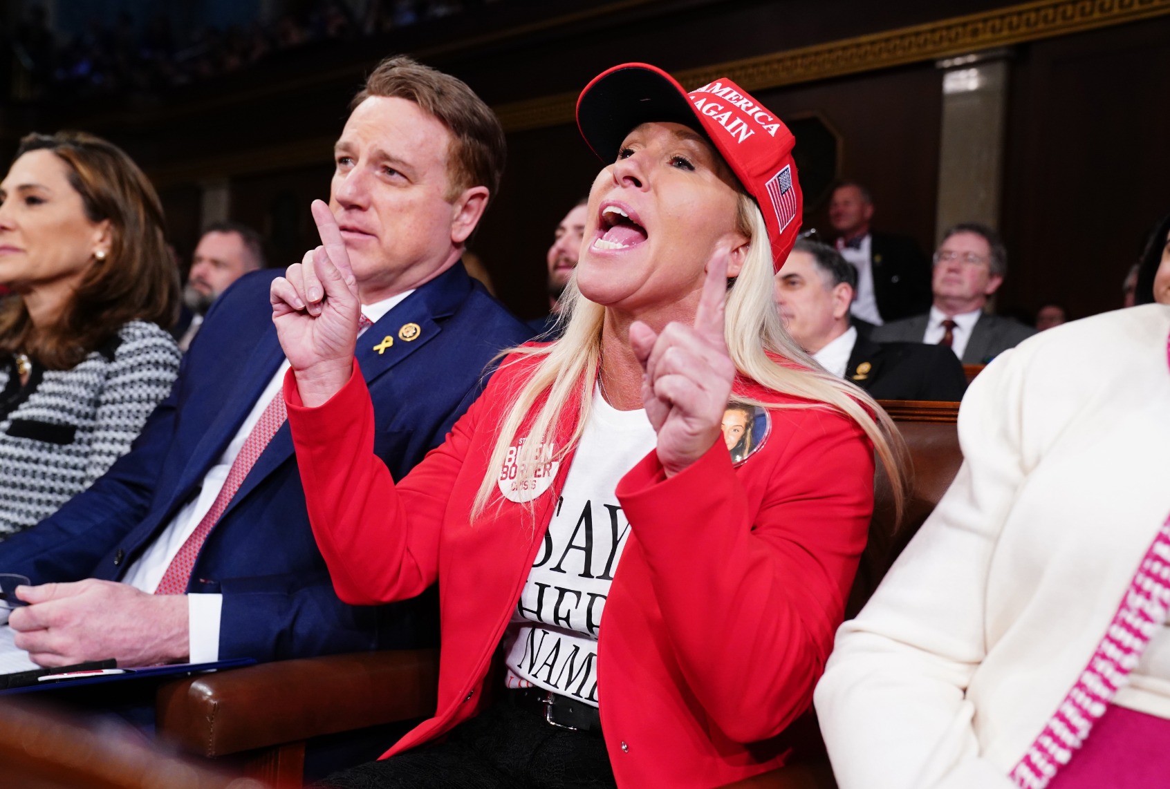 Rep. Marjorie Taylor Greene (R-GA) shouts at President Joe Biden as he delivers the State of the Union on March 7, 2024 in Washington, DC. (Shawn Thew-Pool/Getty Images)