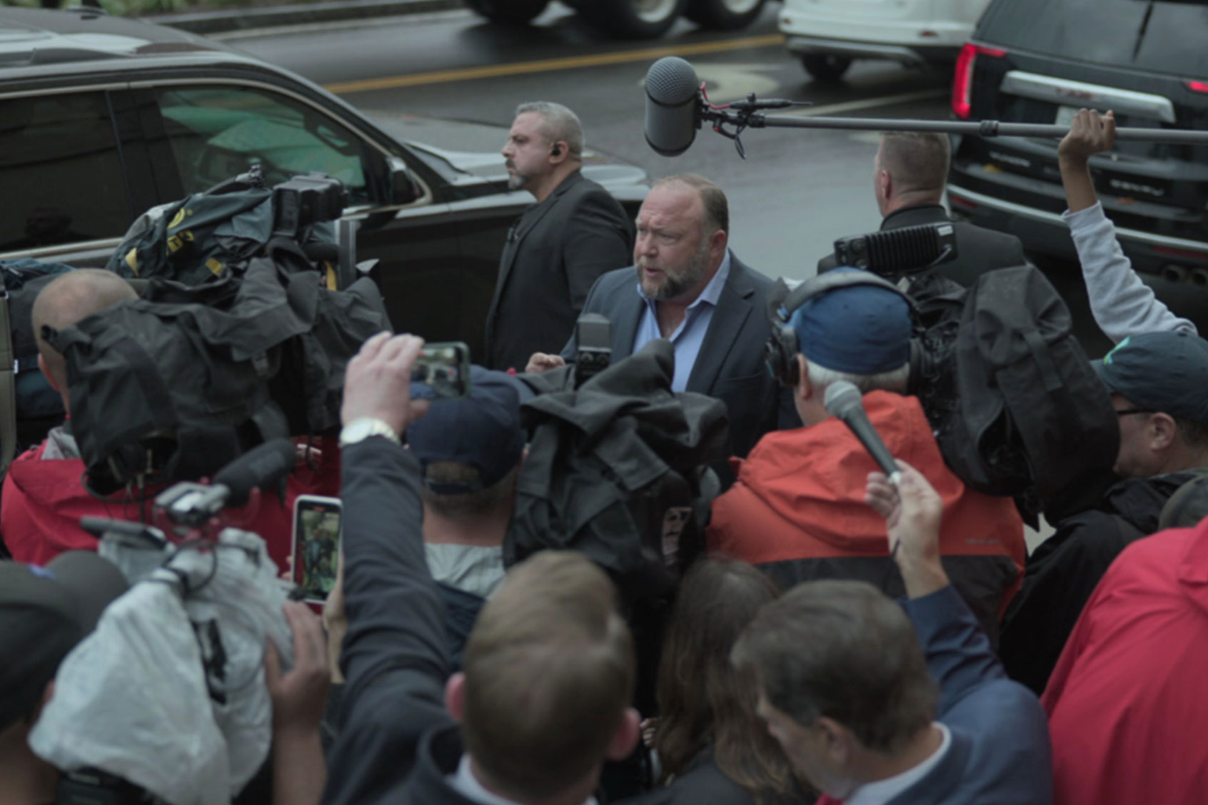 Alex Jones outside court in "The Truth vs. Alex Jones" (HBO)