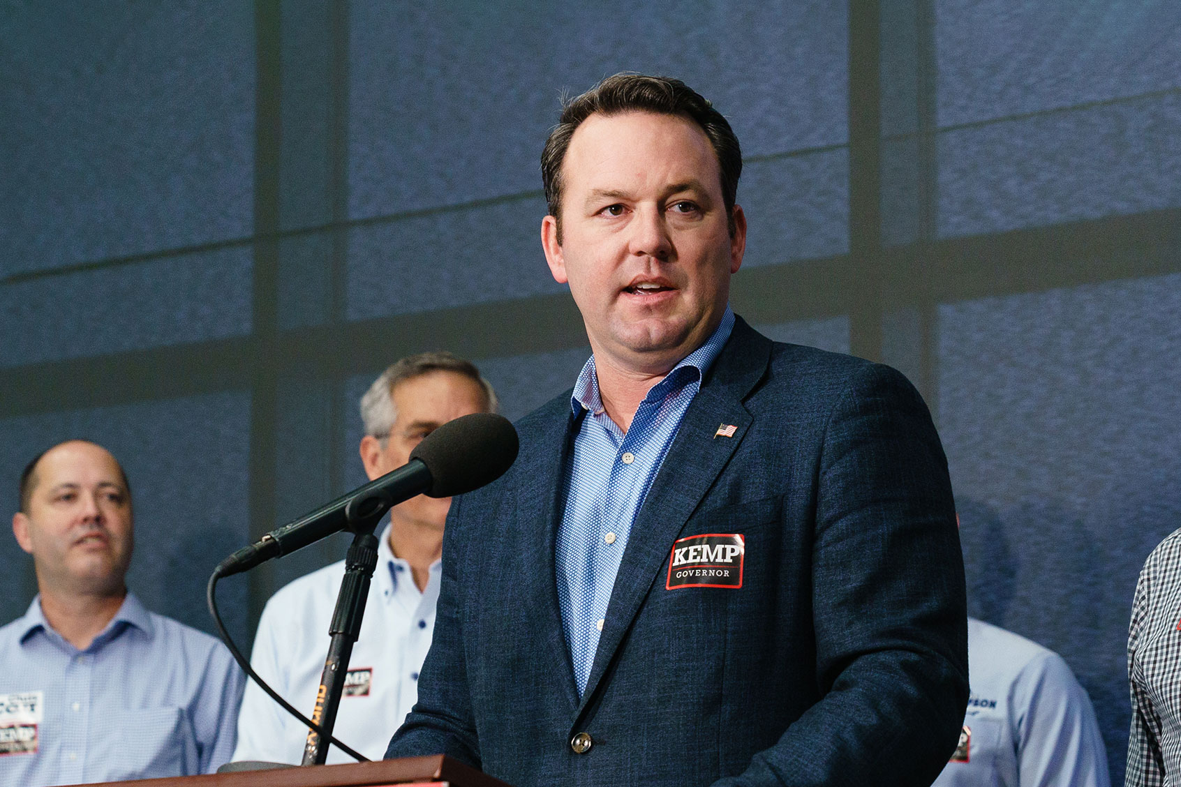 Burt Jones, Republican candidate for Lieutenant Governor speaks as Republican Governor Brian Kemp listens at a press conference on November 7, 2022 in Atlanta, Georgia. (Elijah Nouvelage/Getty Images)