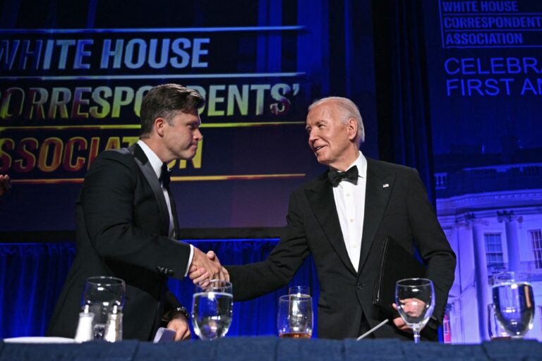 President Joe Biden greets comedian Colin Jost during the White House Correspondents' Association (WHCA) dinner at the Washington Hilton, in Washington, DC, on April 27, 2024. (BRENDAN SMIALOWSKI/AFP via Getty Images)