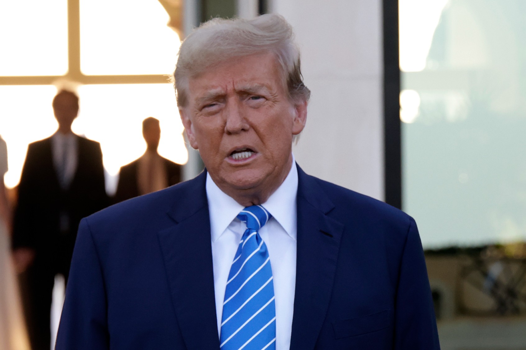 Republican presidential candidate, former U.S. President Donald Trump arrives at the home of billionaire investor John Paulson on April 6, 2024 in Palm Beach, Florida. (Alon Skuy/Getty Images)