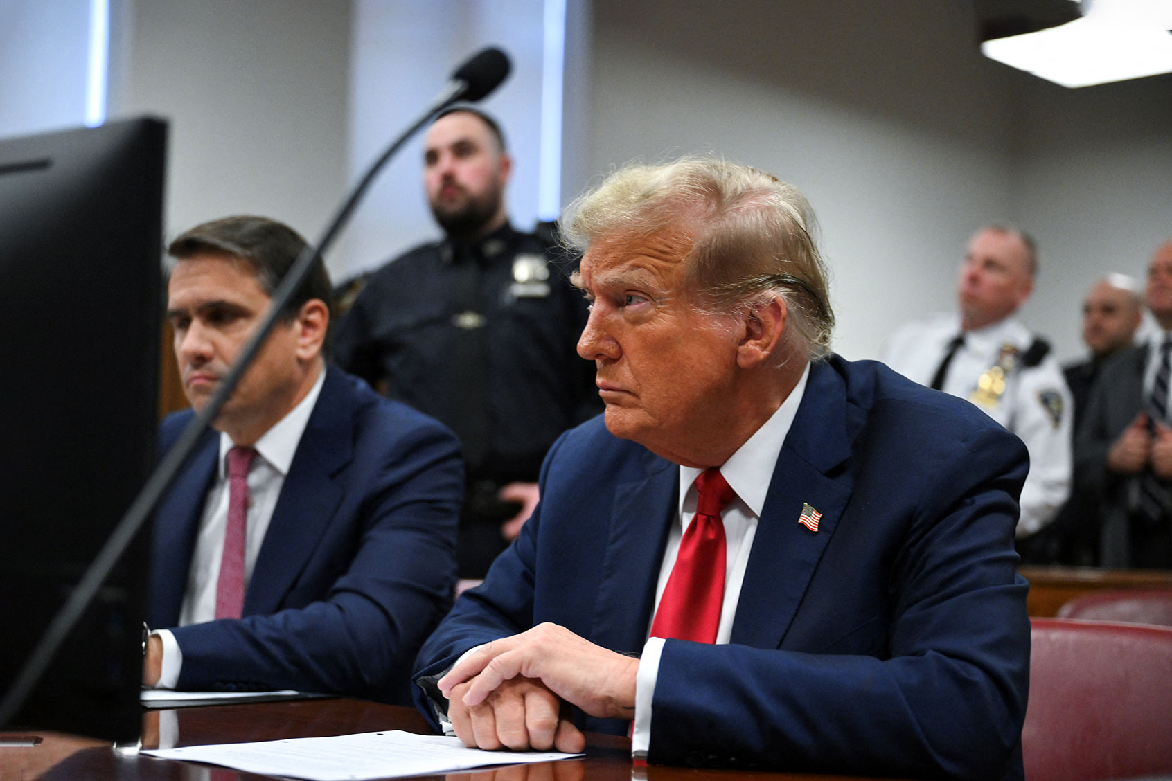 Former US President Donald Trump attends the first day of his trial for allegedly covering up hush money payments linked to extramarital affairs, at Manhattan Criminal Court in New York City on April 15, 2024. (ANGELA WEISS/POOL/AFP via Getty Images)