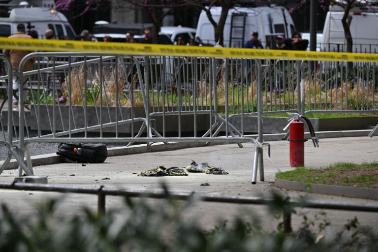 Fire extinguishers (R) are left at the park across from Manhattan Criminal Court in New York City after a man reportedly set himself on fire during the trial of US President Donald Trump, in New York City on April 19, 2024. (ANGELA WEISS/AFP via Getty Images)