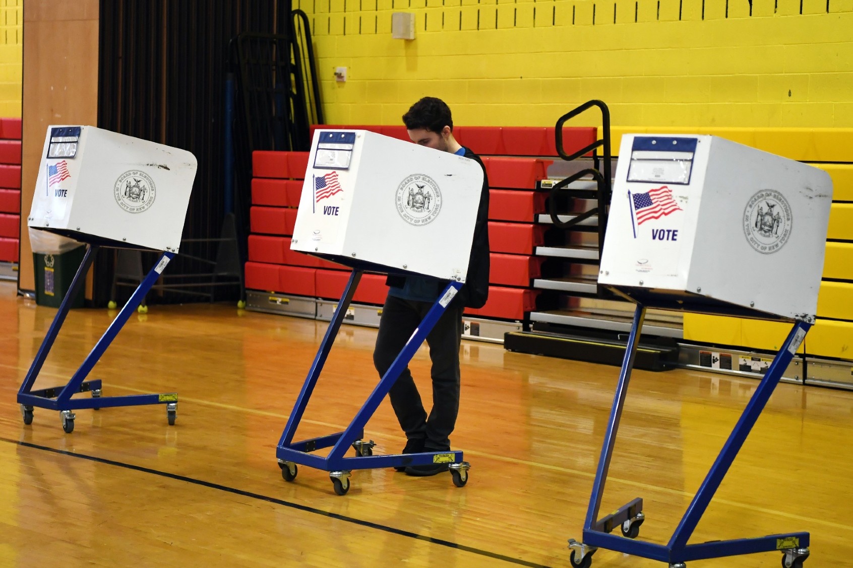 A voter fills in his ballot at a polling station in New York on April 2, 2024. (Li Rui/Xinhua via Getty Images)