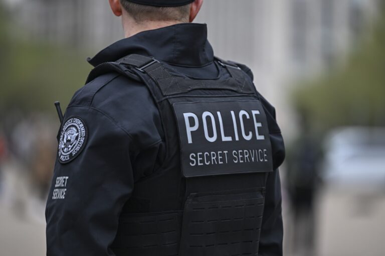 Secret Service agents on duty at Pennsylvania Avenue in front of the White House in Washington D.C., on April 7, 2023. (Celal Gunes/Anadolu Agency via Getty Images)