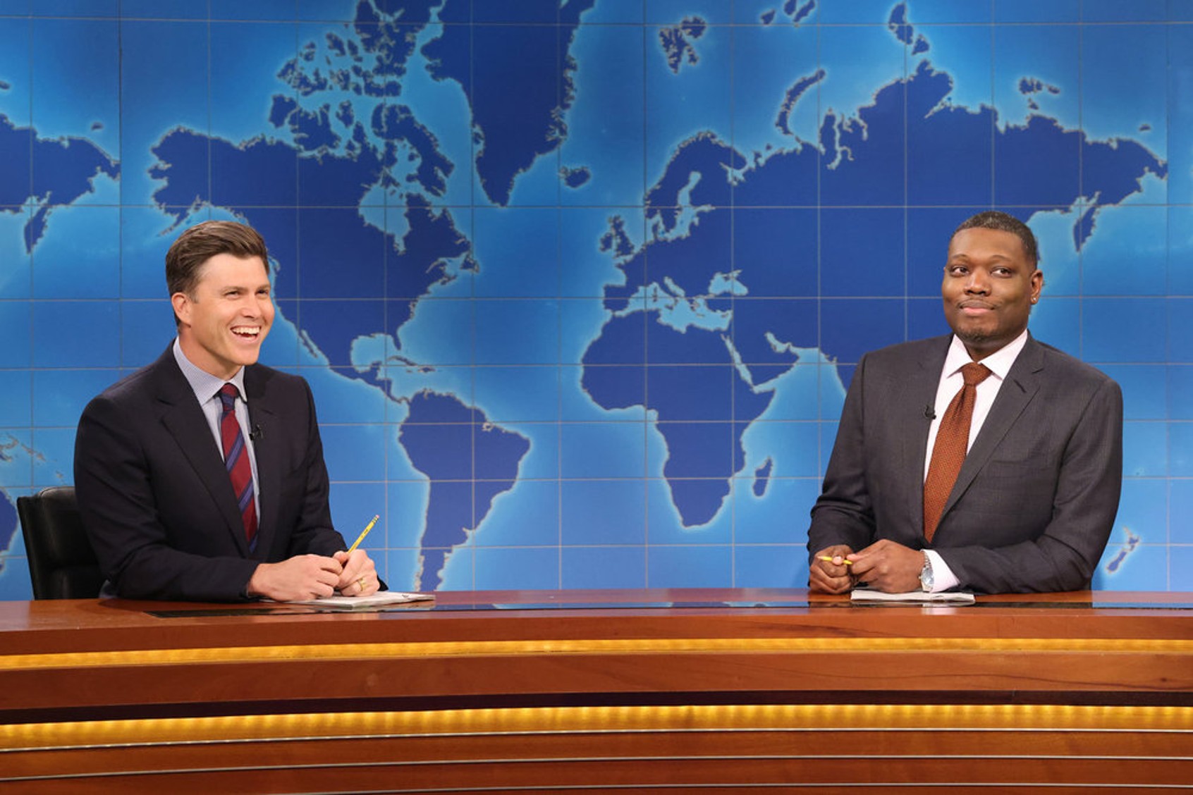 (l-r) Anchor Colin Jost and anchor Michael Che during "Weekend Update" on "Saturday Night Live" (Will Heath/NBC)
