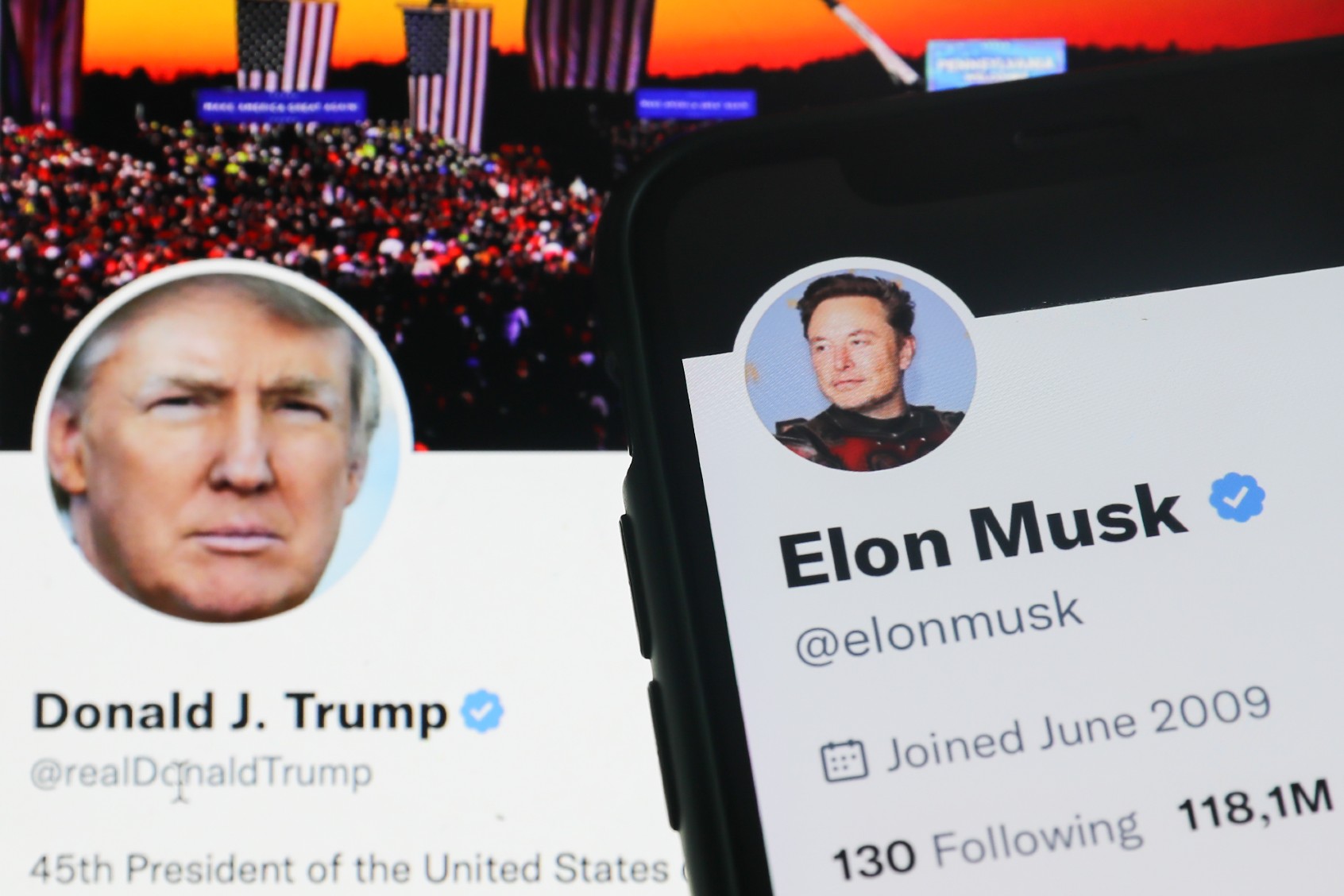 Donald Trump Twitter account displayed on a laptop screen and Elon Musk Twitter account displayed on a phone screen are seen in this illustration photo (Jakub Porzycki/NurPhoto via Getty Images)