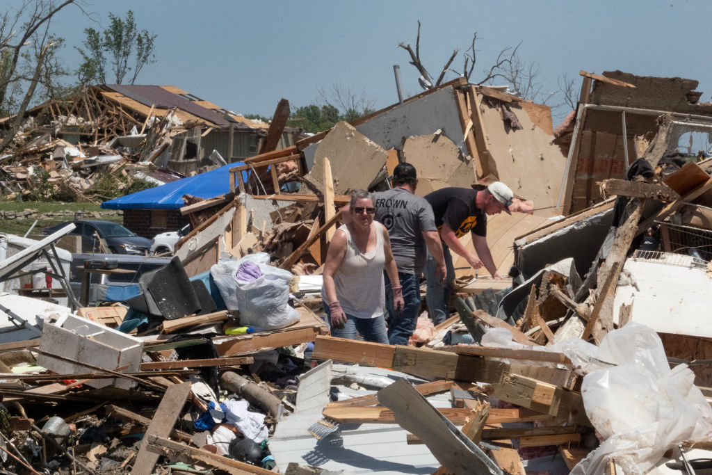Residents clean up after destructive tornado on May 23, 2024, in Greenfield, Iowa. (Scott Olson/Getty Images)