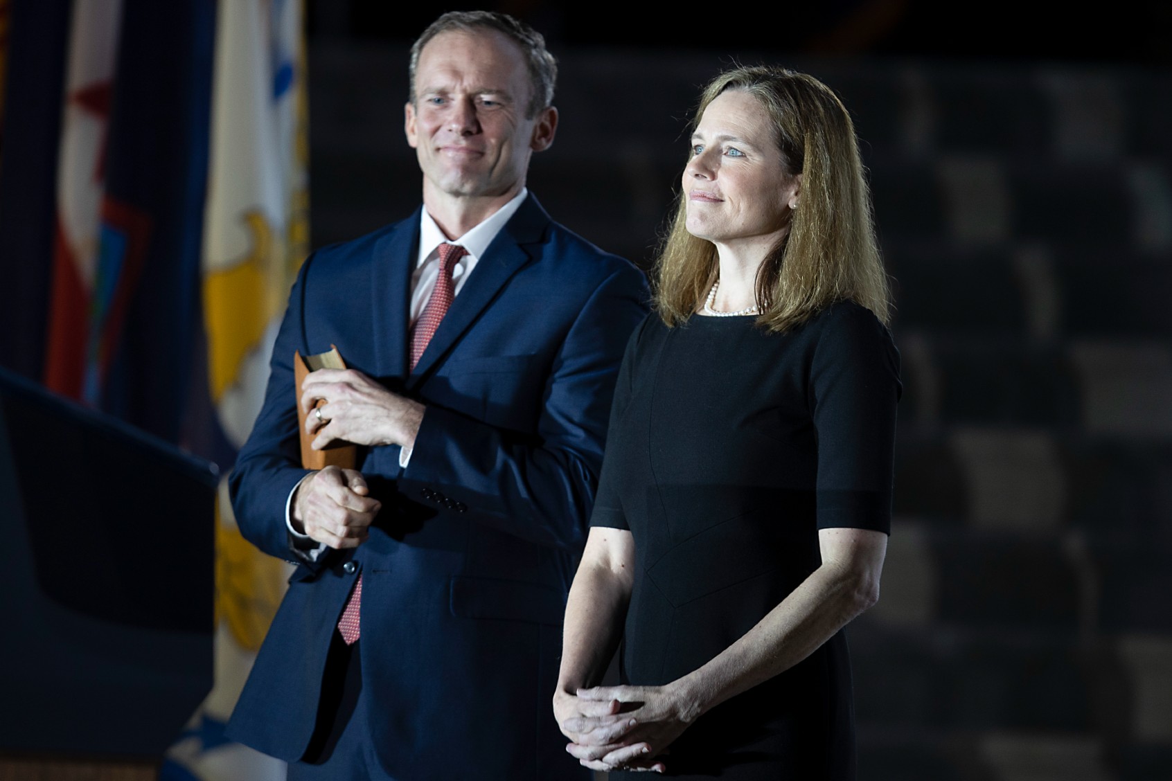 Newly sworn in U.S. Supreme Court Associate Justice Amy Coney Barrett and her husband Jesse Barrett look on during her ceremonial swearing-in on the South Lawn of the White House October 26, 2020 in Washington, DC. (Tasos Katopodis/Getty Images)