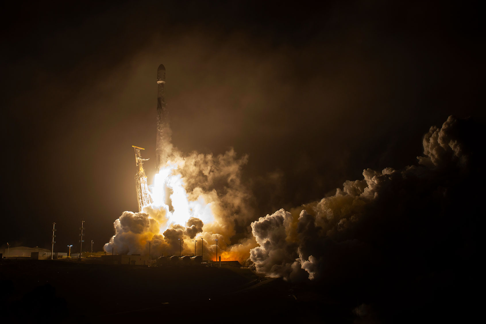 NASA's Double Asteroid Redirection Test (DART) spacecraft sets off to collide with an asteroid in the world's first full-scale planetary defense test mission on Wednesday, Nov. 24, from Space Launch Complex 4 East at Vandenberg Space Force Base in California. (NASA/Bill Ingalls)