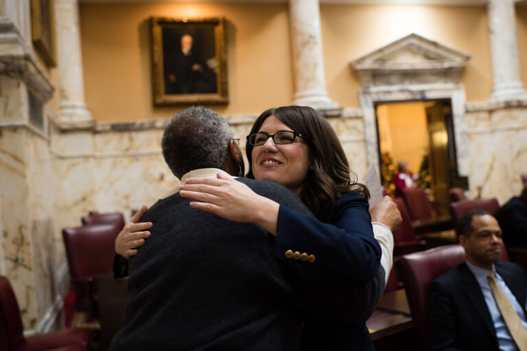 Sen. Sarah Elfreth gives a hug to Joy Walker, the Office administrator for Senater Thomas V. Miller Jr., the president of the Maryland Senate during an orientation in the Senate Chamber on December 06, 2018. (Sarah L. Voisin/The Washington Post via Getty Images)