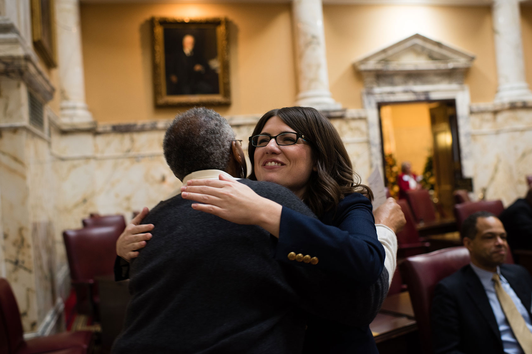 Sen. Sarah Elfreth gives a hug to Joy Walker, the Office administrator for Senater Thomas V. Miller Jr., the president of the Maryland Senate during an orientation in the Senate Chamber on December 06, 2018. (Sarah L. Voisin/The Washington Post via Getty Images)
