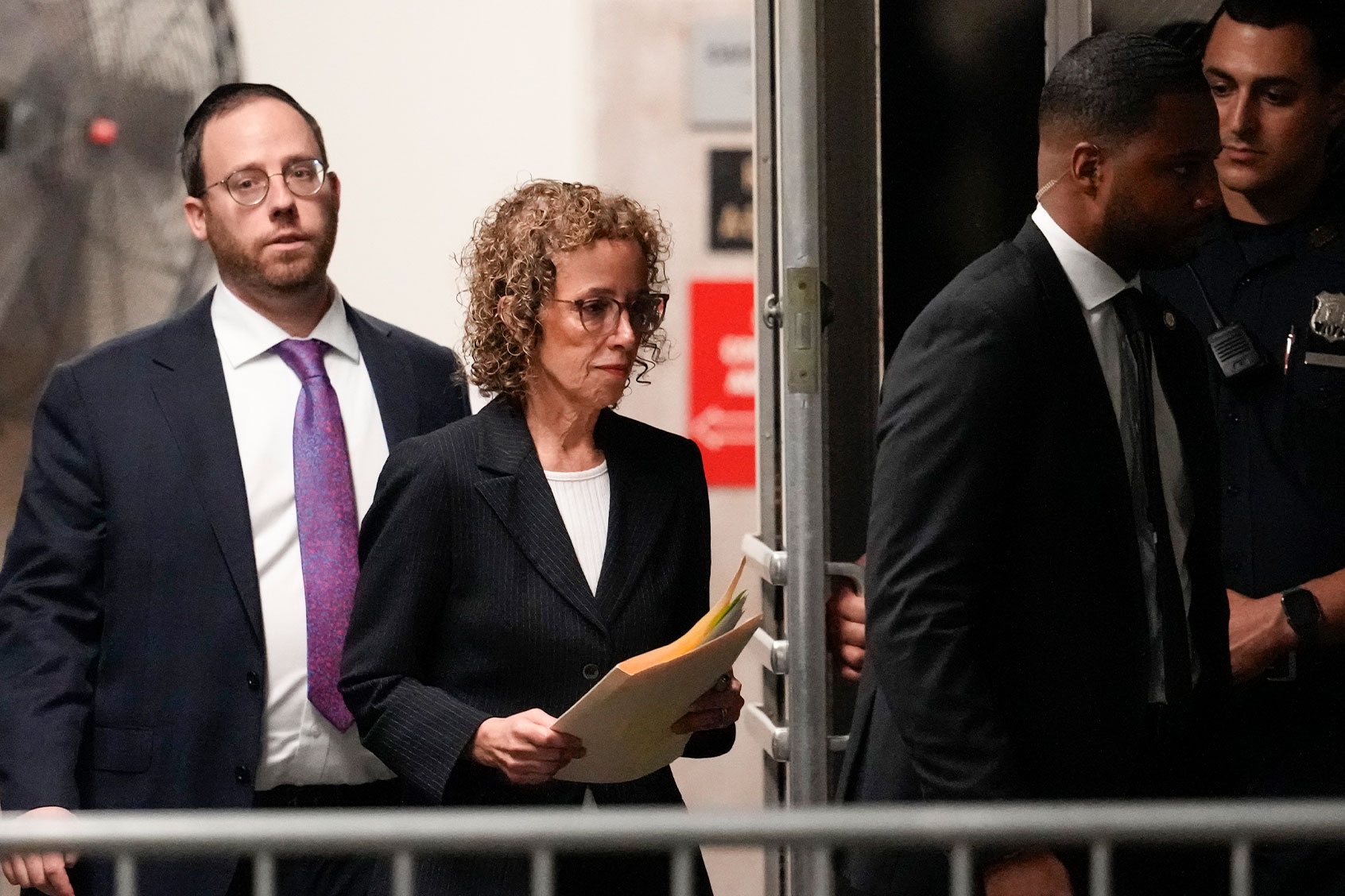 Former President Donald Trump's attorney Susan Necheles, center, returns to the courtroom after an afternoon break in Trump's trial at Manhattan Criminal Court on May 7, 2024 in New York City. (Mary Altaffer-Pool/Getty Images)