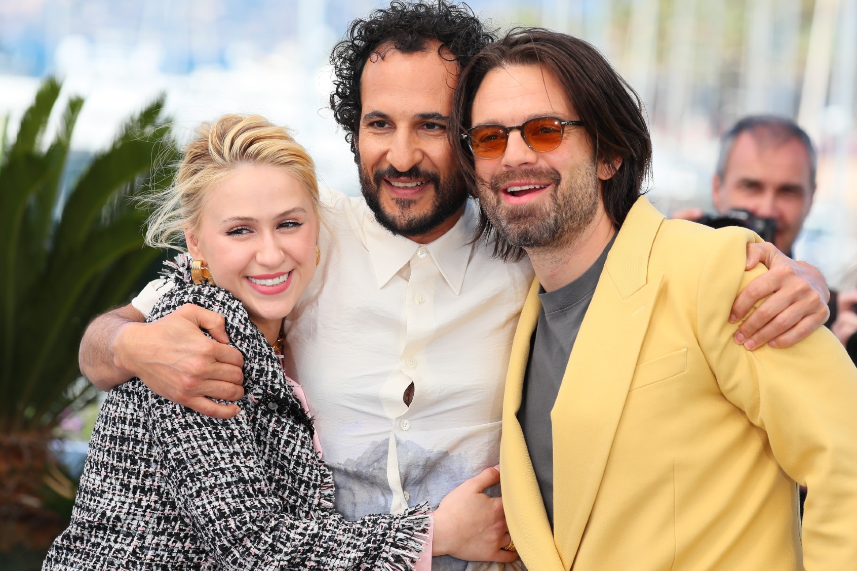 Maria Bakalova, Ali Abbasi and Sebastian Stan attend "The Apprentice" Photocall at the 77th annual Cannes Film Festival at Palais des Festivals on May 21, 2024 in Cannes, France. (JB Lacroix/FilmMagic/Getty)