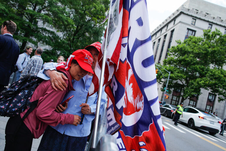 People react after former US President and Republican presidential candidate Donald Trump was convicted in his criminal trial outside of Manhattan Criminal Court in New York City, on May 30, 2024. (KENA BETANCUR/AFP via Getty Images)