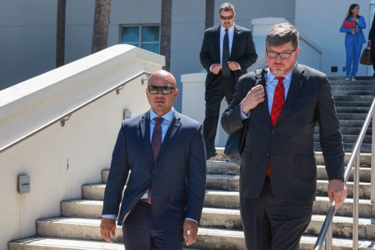 Walt Nauta (L), an aide to former U.S. President Donald Trump, walks with his lawyer Stanley Woodward (R) as they leave the Alto Lee Adams Sr United States Courthouse on May 22, 2024 in Fort Pierce, Florida. ( Joe Raedle/Getty Images)