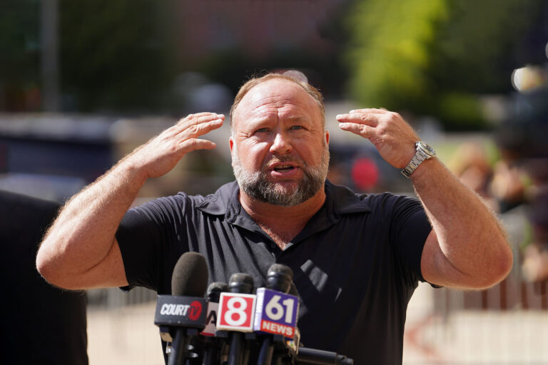InfoWars founder Alex Jones speaks to the media outside Waterbury Superior Court during his trial on September 21, 2022 in Waterbury, Connecticut. (Joe Buglewicz/Getty Images)