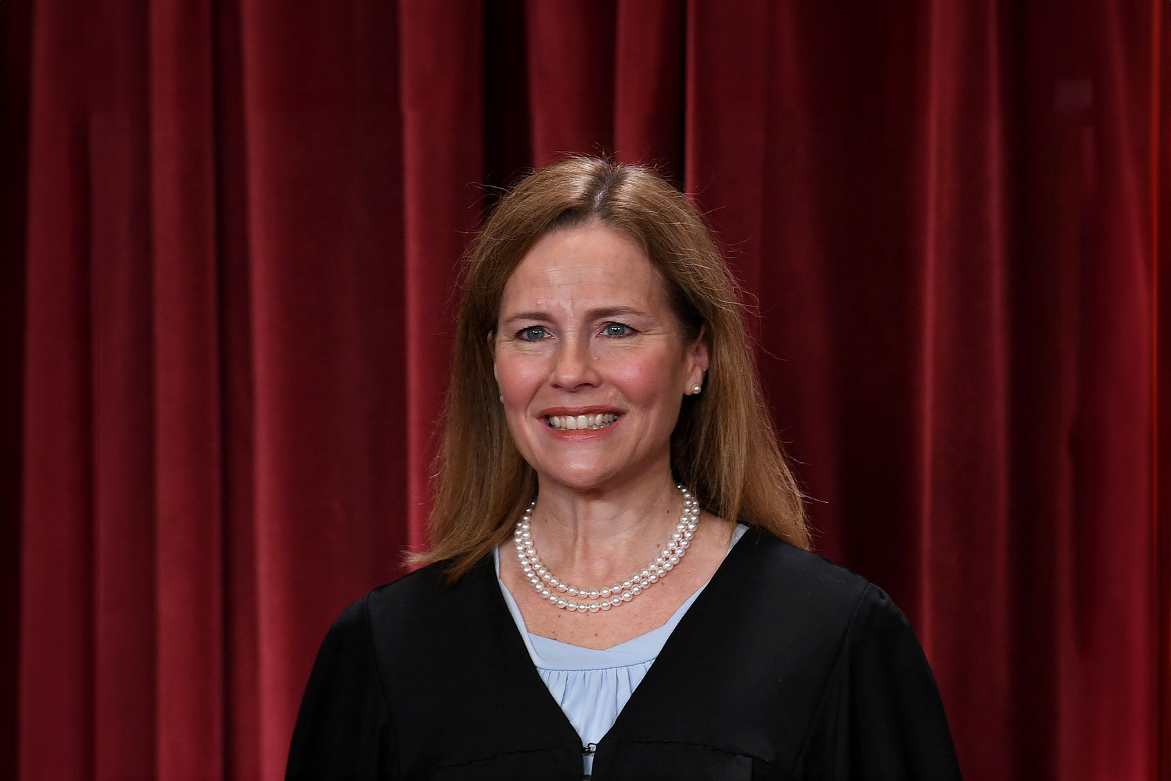 Associate US Supreme Court Justice Amy Coney Barrett poses for the official photo at the Supreme Court in Washington, DC on October 7, 2022. (OLIVIER DOULIERY/AFP via Getty Images)