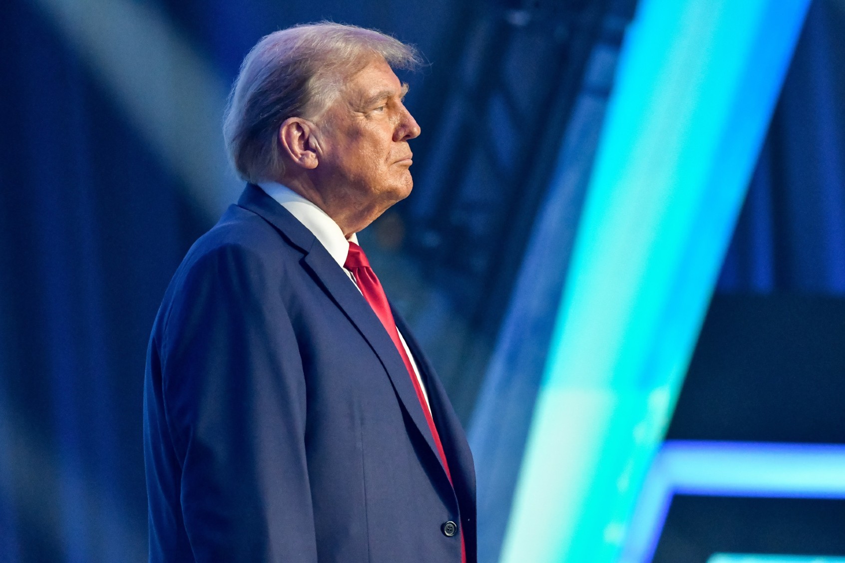 Former President Donald Trump takes the stage to speak at The People's Convention hosted by Turning Point Action at The Huntington Place in Detroit, MI on June 15, 2024. (Adam J. Dewey/Anadolu via Getty Images)