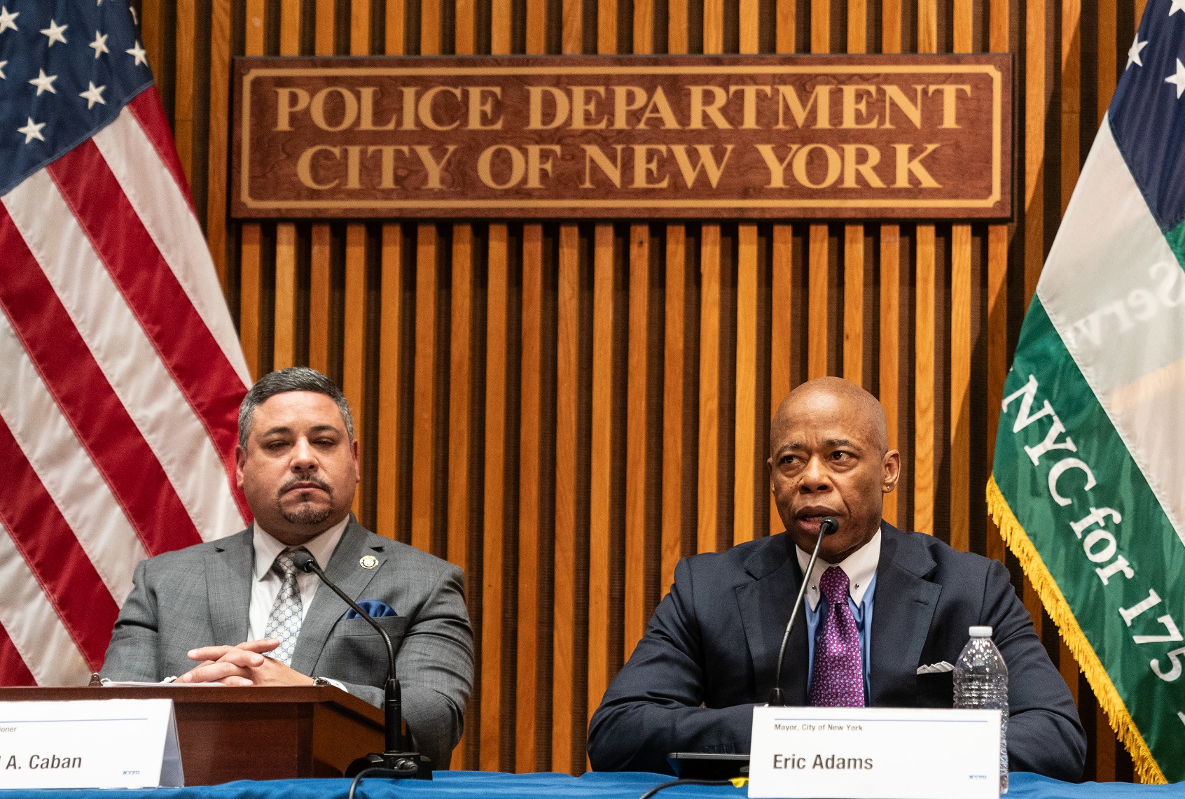 Mayor Eric Adams speaks as Police Commissioner Edward Caban listens during announcement end-of-year citywide crime statistics at One Police Plaza. ( Lev Radin/Pacific Press/LightRocket via Getty Images)