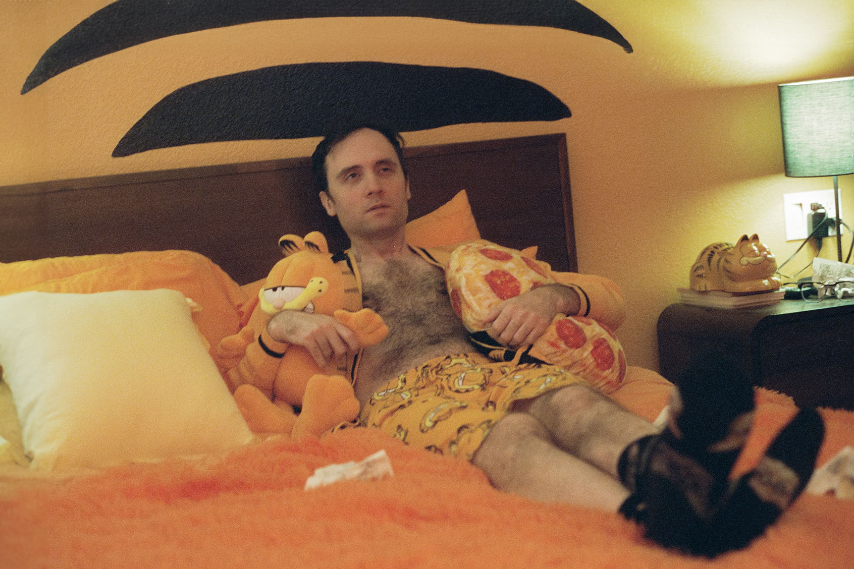 Joey Clift has a lost weekend with Garfield at the Motel 6 Garfield Suite (Photo by Matt Mazany)