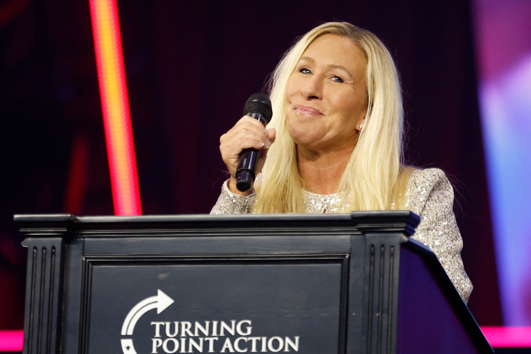 U.S. Representative Marjorie Taylor Greene, Republican of Georgia, speaks at the Turning Point Convention on June 15, 2024, at Huntington Place Convention Center in Detroit, Michigan. (JEFF KOWALSKY/AFP via Getty Images)